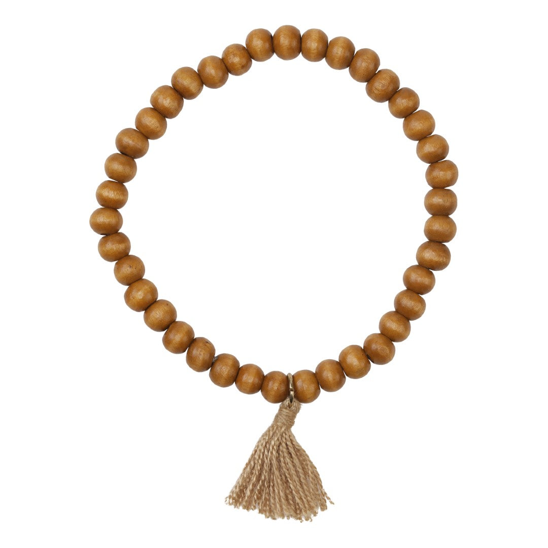 Bracelet with wooden beads of mango wood beige tassel